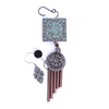 Copper metal wind chimes in the shape of flowers